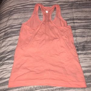 Lululemon orange swiftly tank top